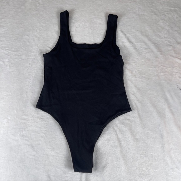 a new day Tops - NWOT A new day Black bodysuit